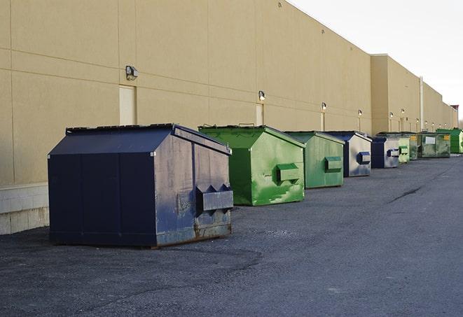 an assortment of sturdy and reliable waste containers near a construction area in Castaic, CA